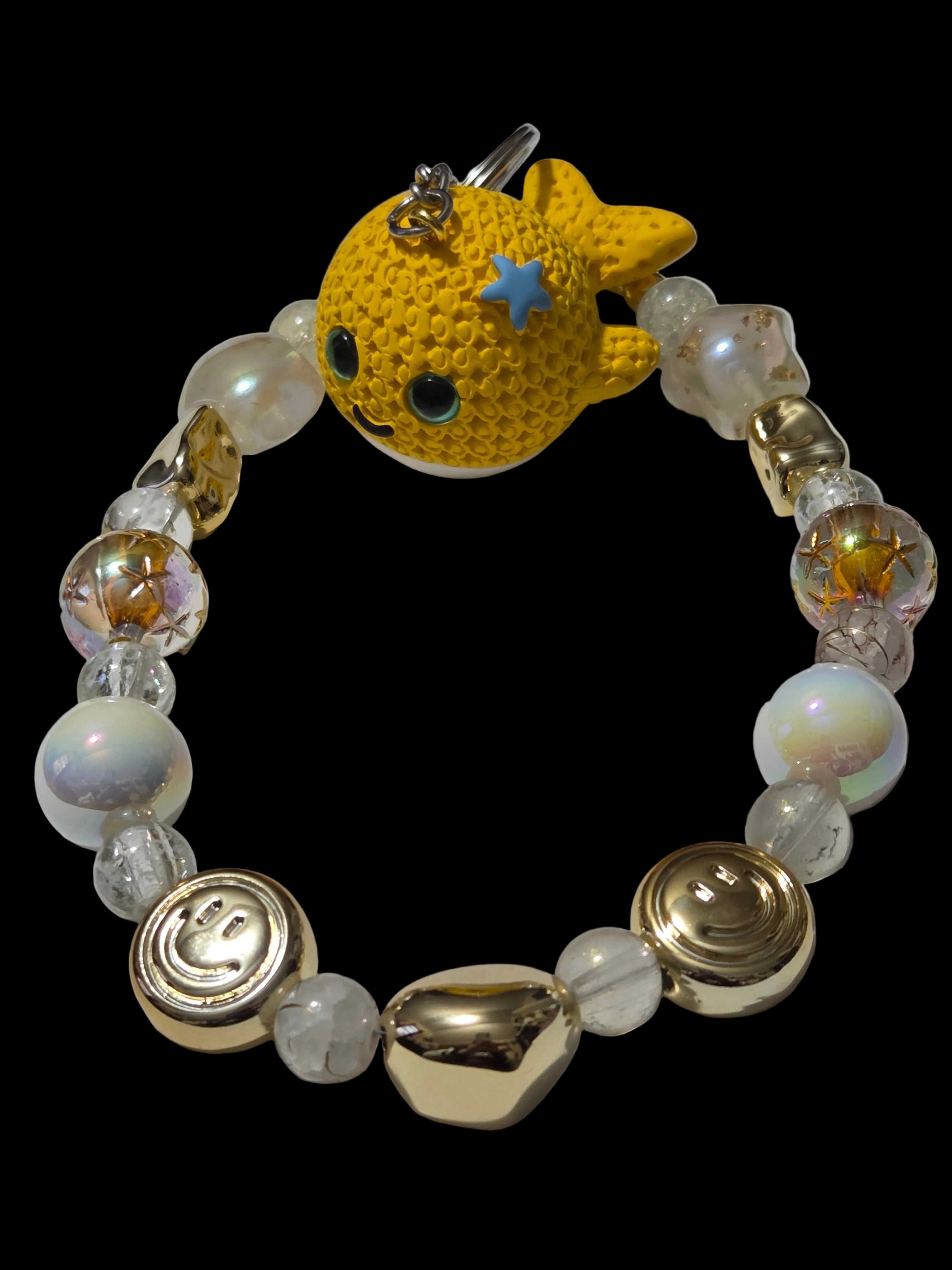 Yellow , gold 3d figure Keychains