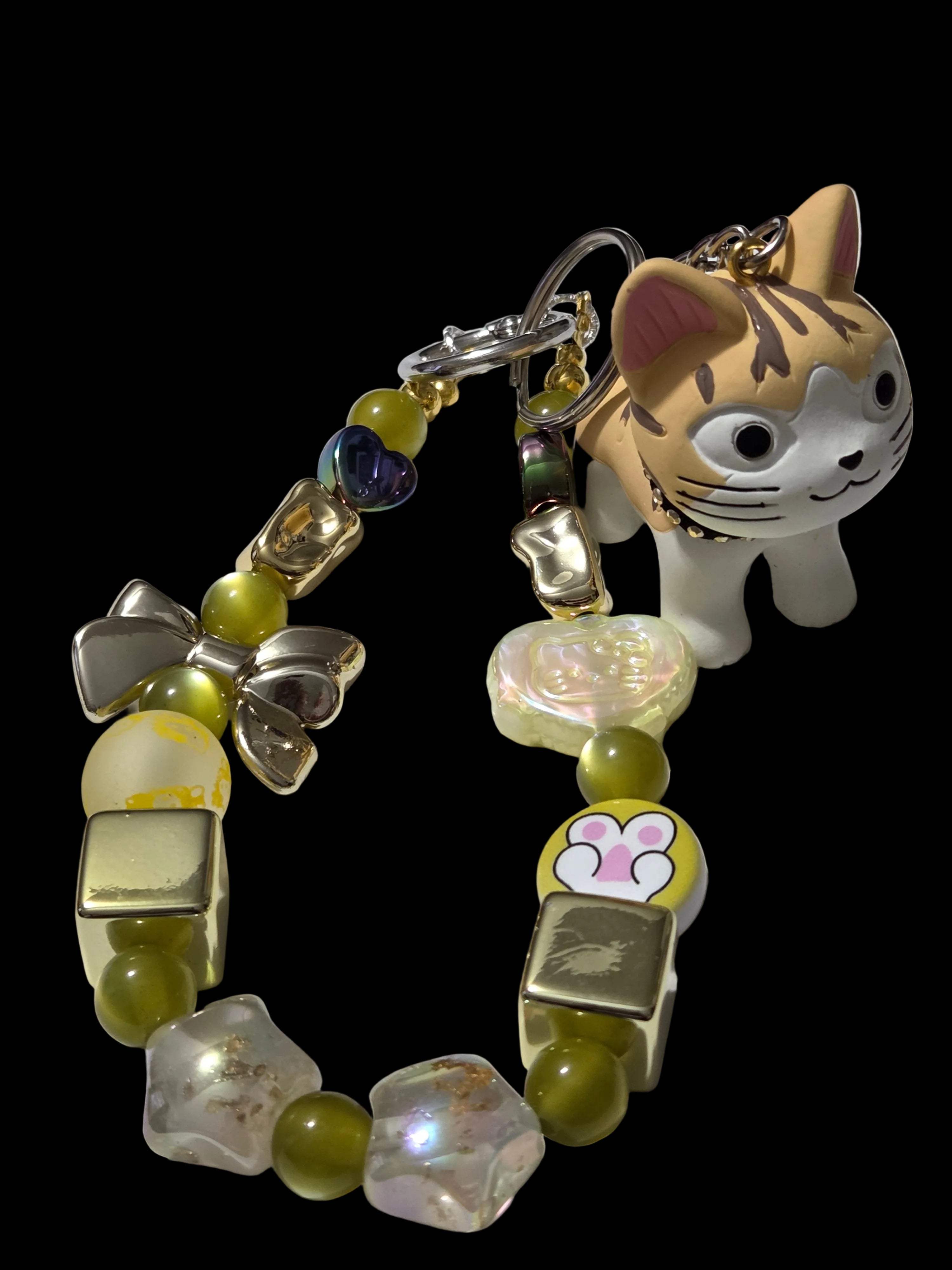 Yellow , gold 3d figure Keychains