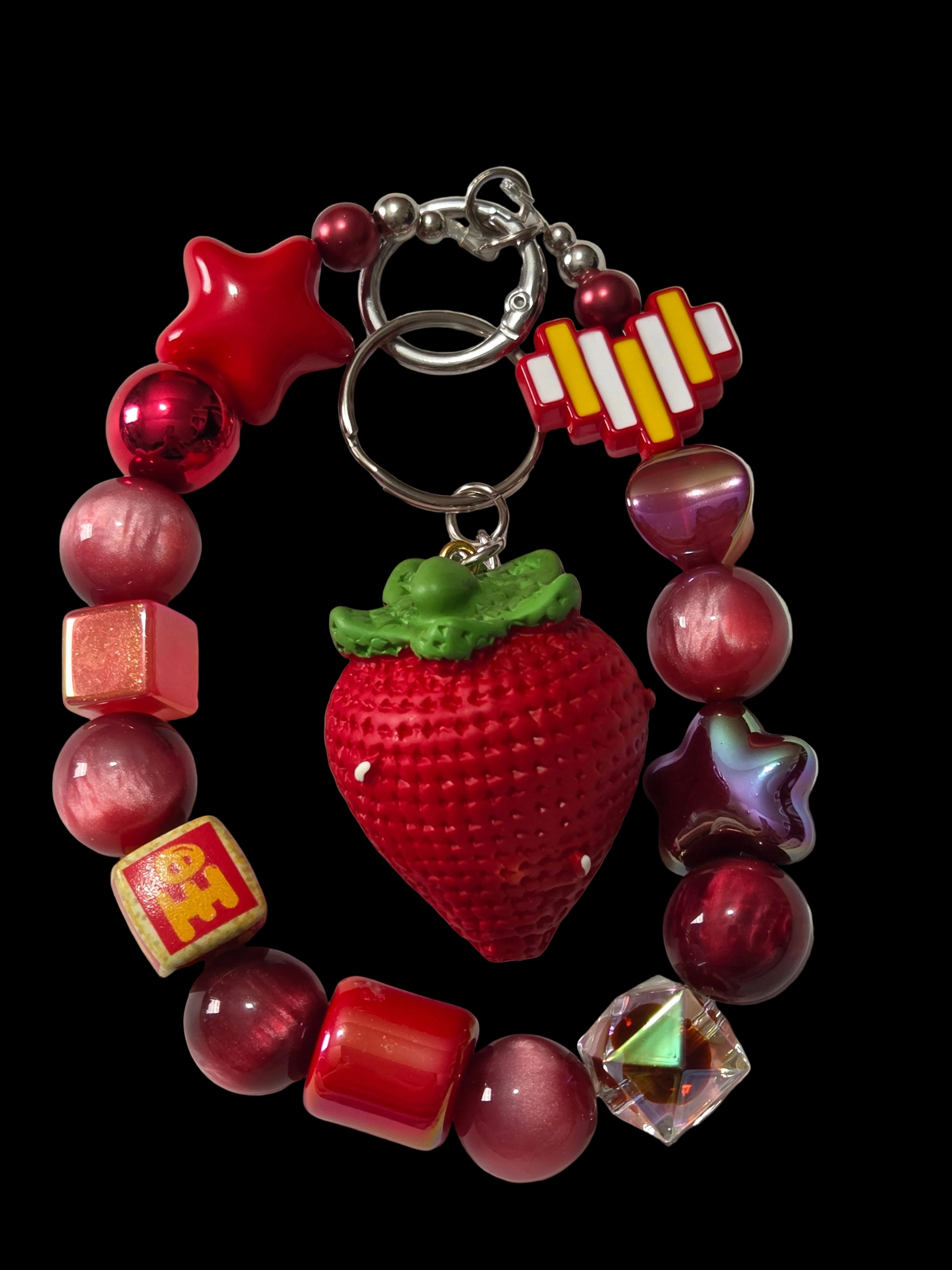 Red and green 3 d figure Keychains