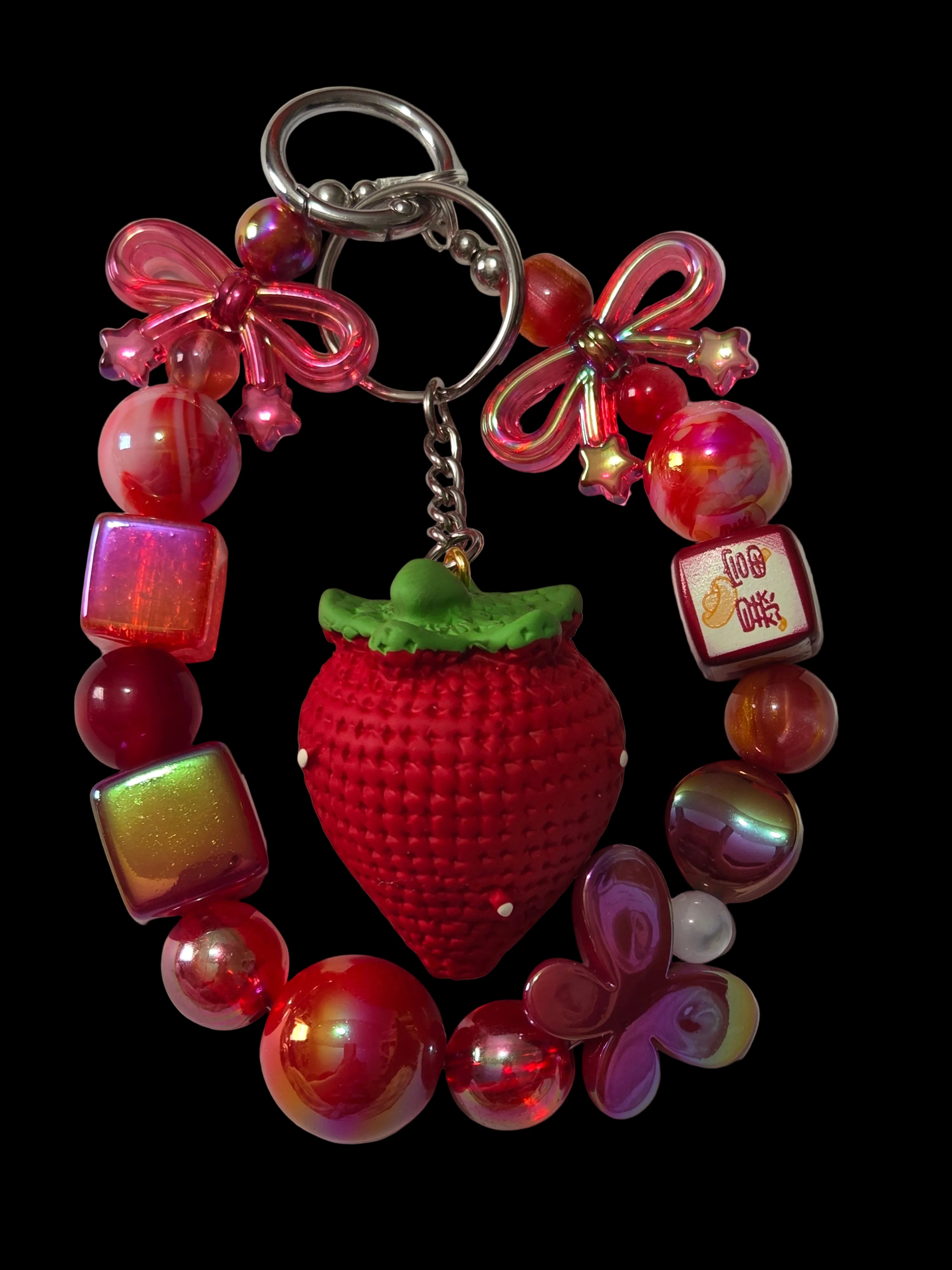 Red and green 3 d figure Keychains