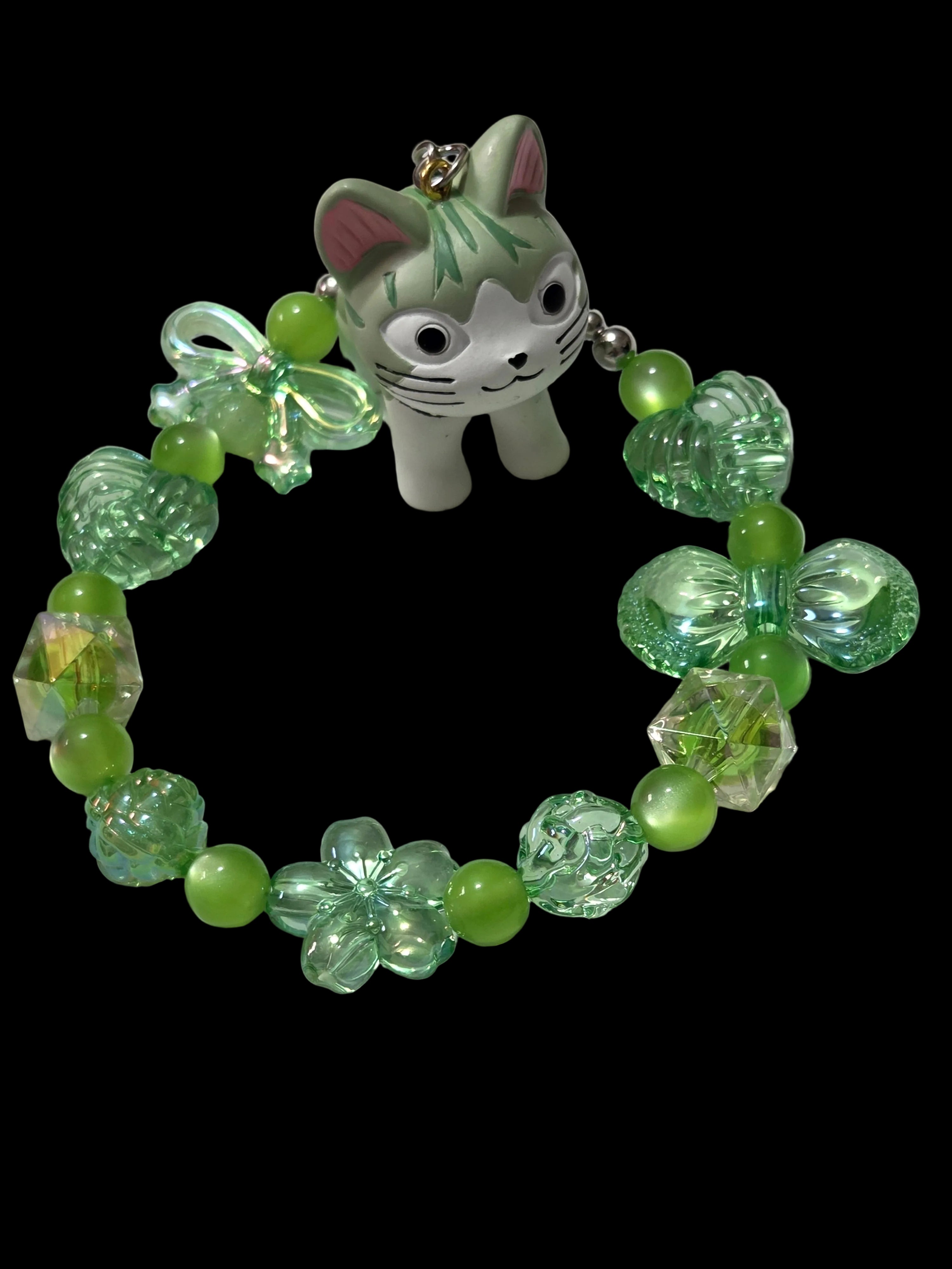 Red and green 3 d figure Keychains