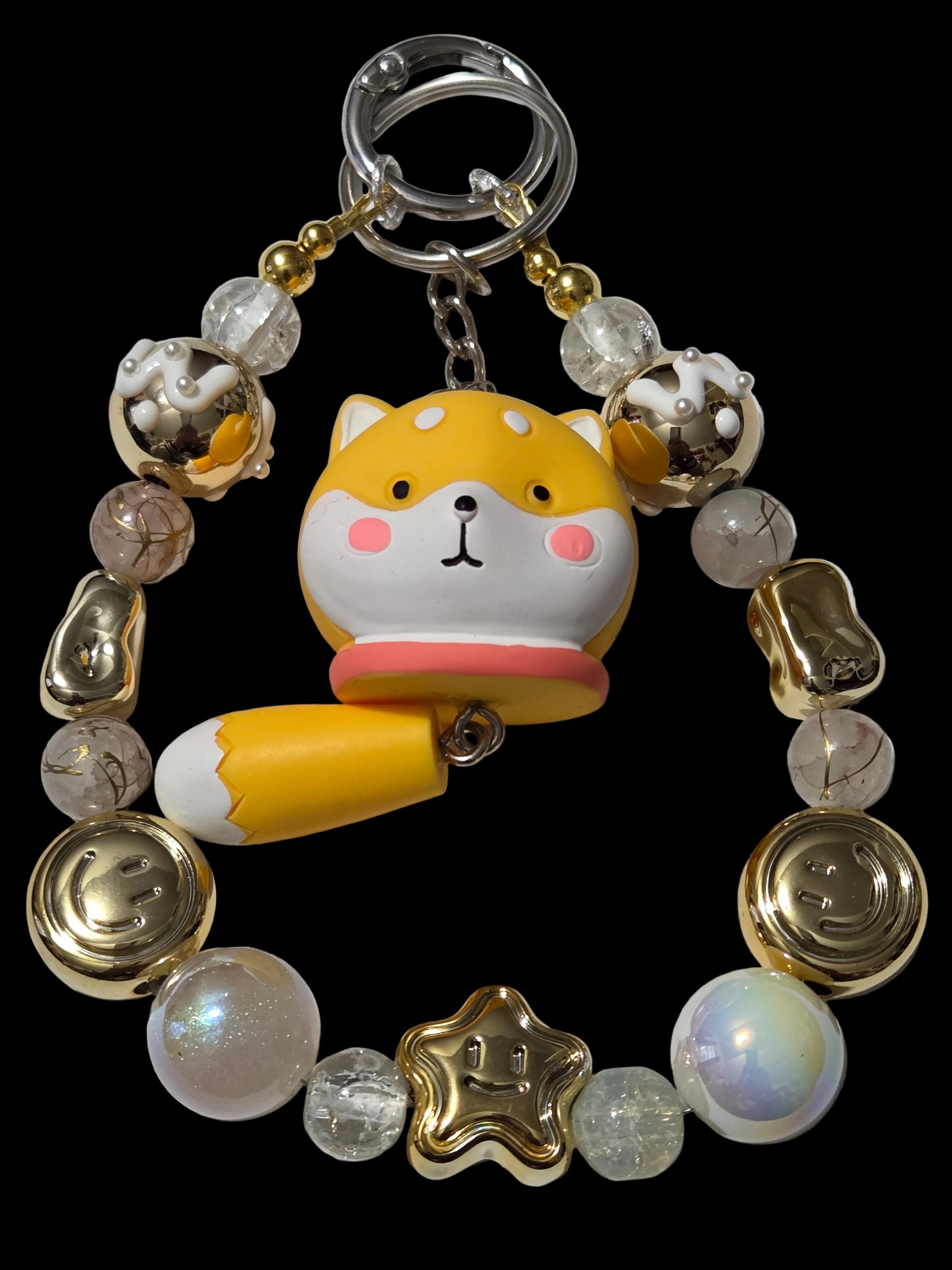 Yellow , gold 3d figure Keychains