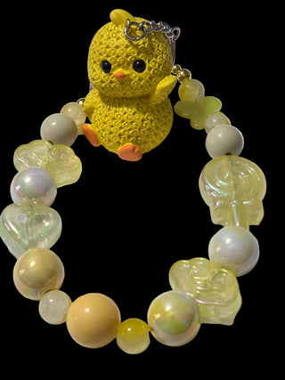 Yellow , gold 3d figure Keychains