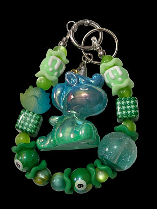 Red and green 3 d figure Keychains