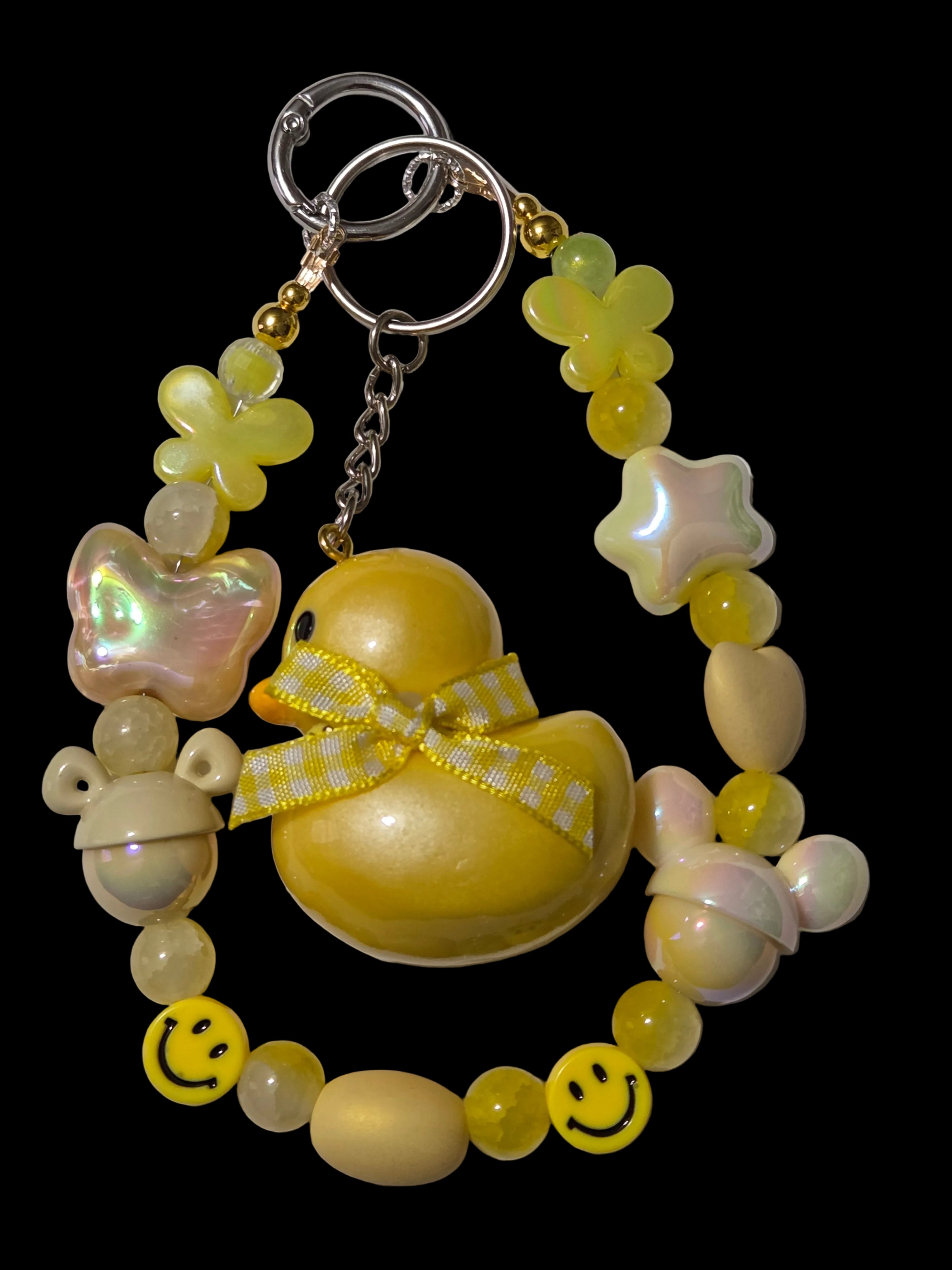 Yellow , gold 3d figure Keychains