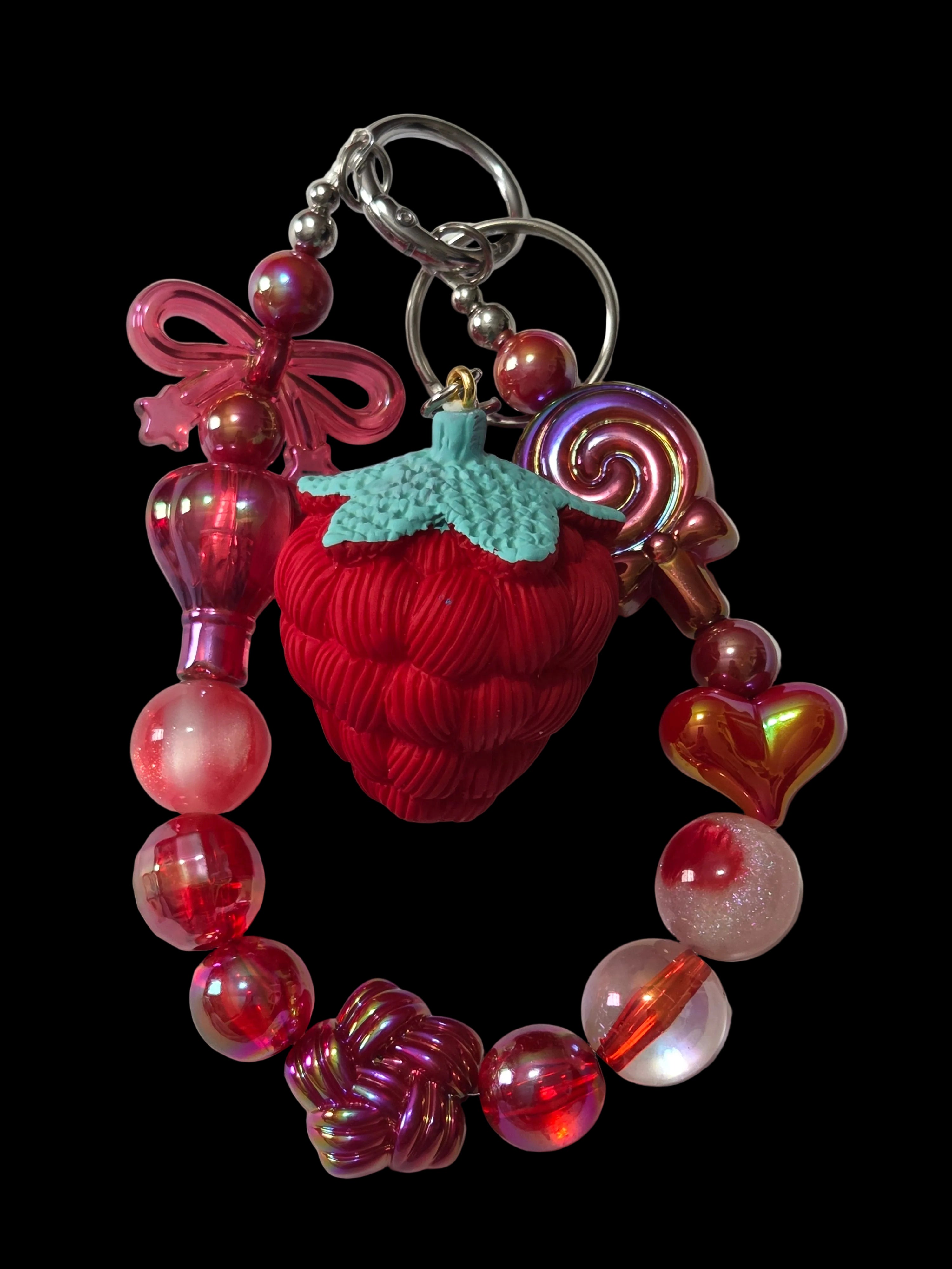 Red and green 3 d figure Keychains