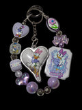 Purple silver . Daisy duck Keychains
