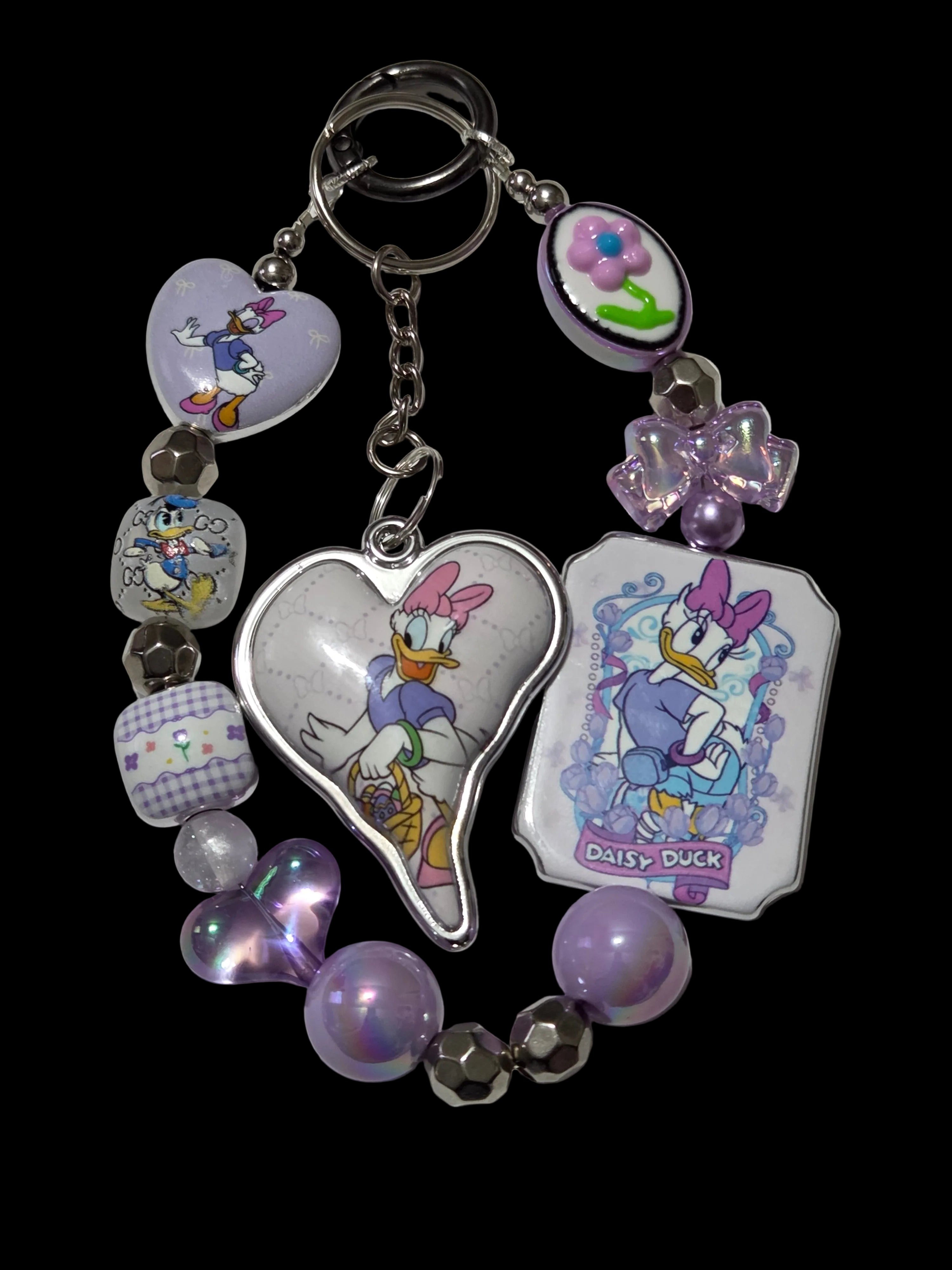 Purple silver . Daisy duck Keychains
