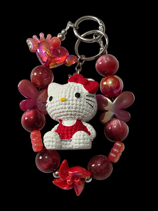 Red and green 3 d figure Keychains