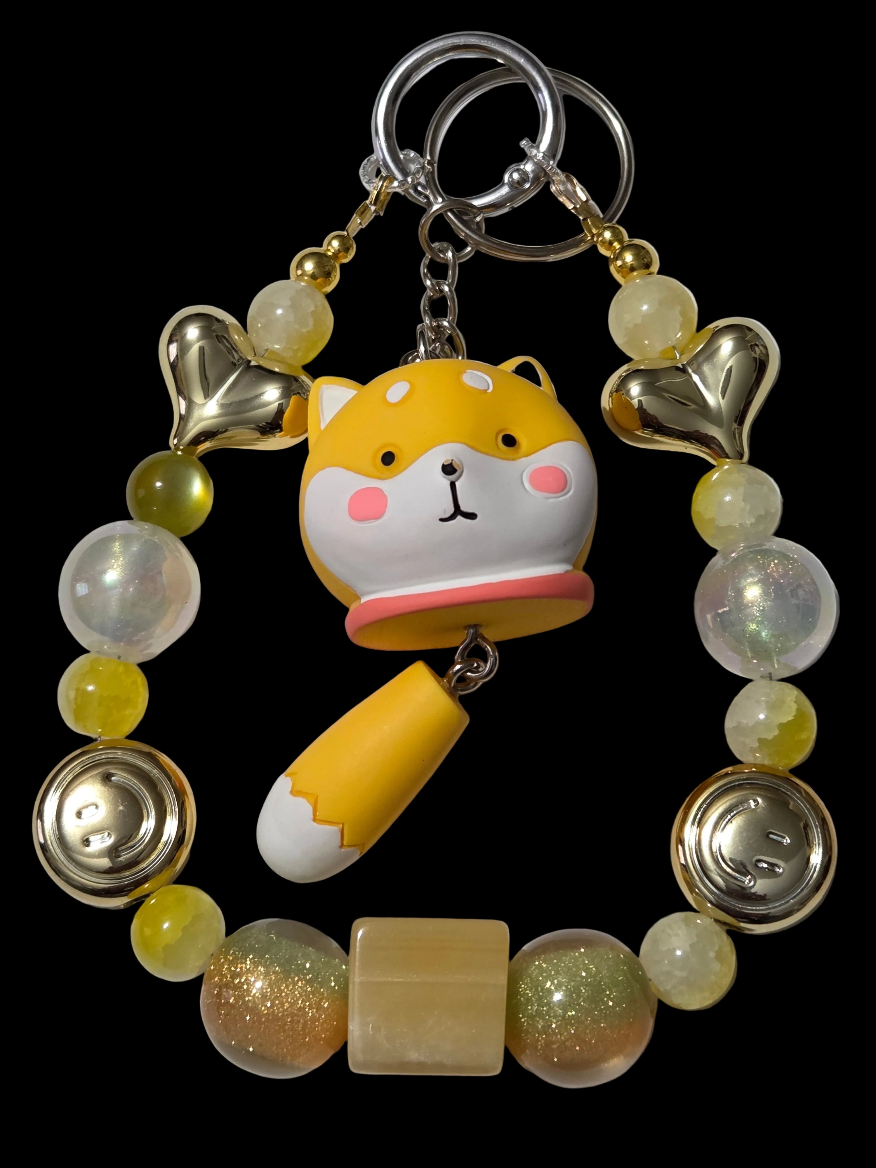 Yellow , gold 3d figure Keychains