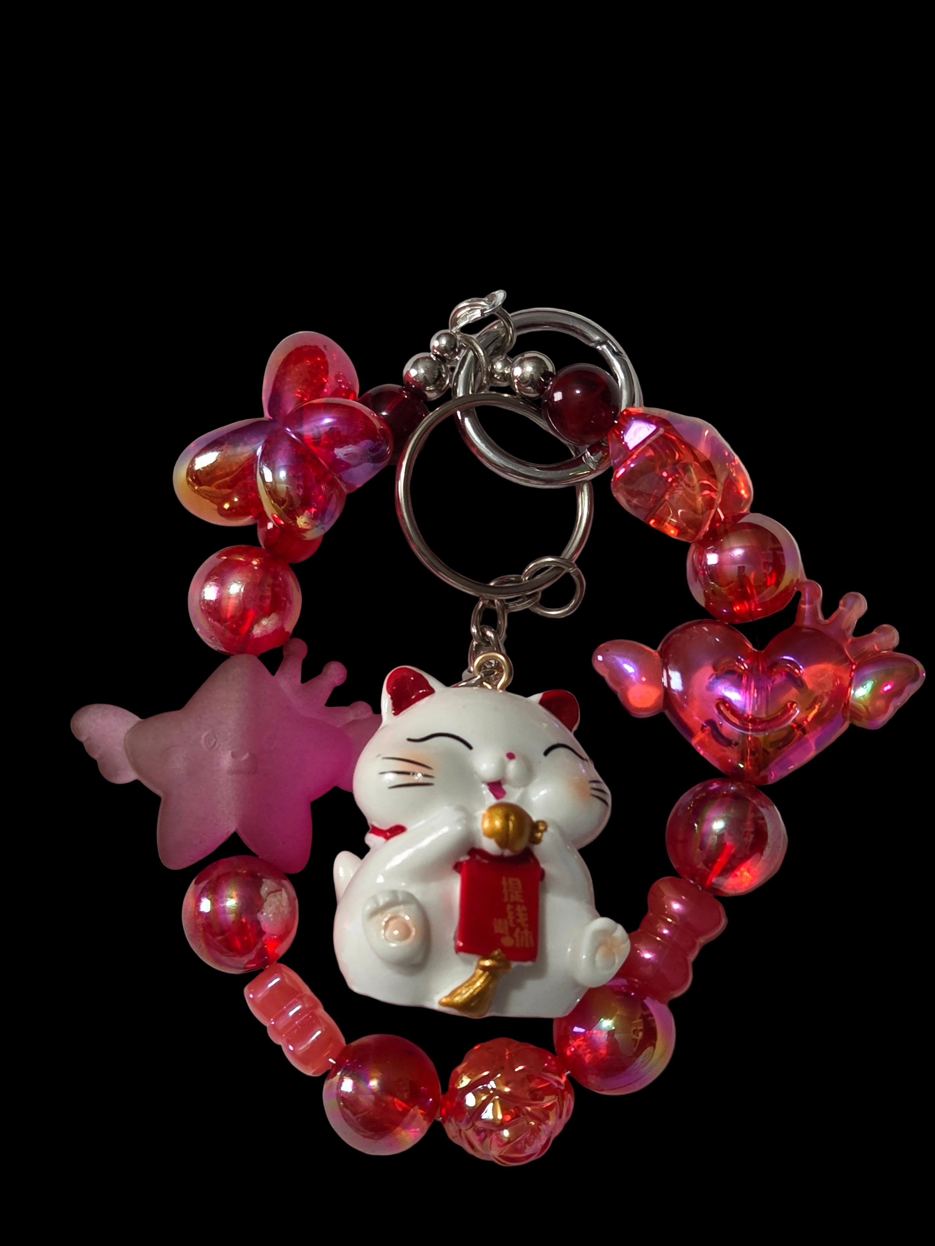 Red and green 3 d figure Keychains