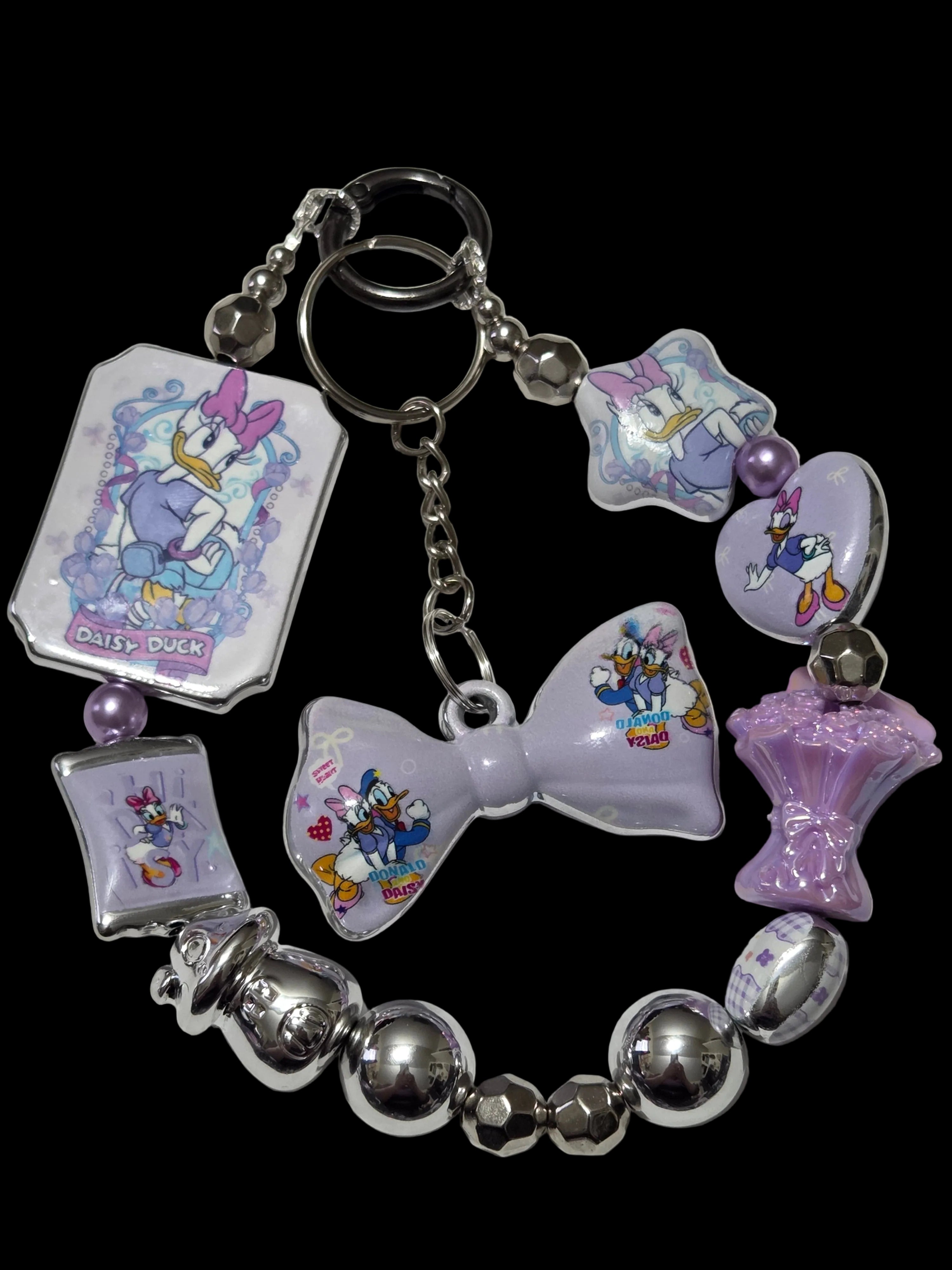 Purple silver . Daisy duck Keychains