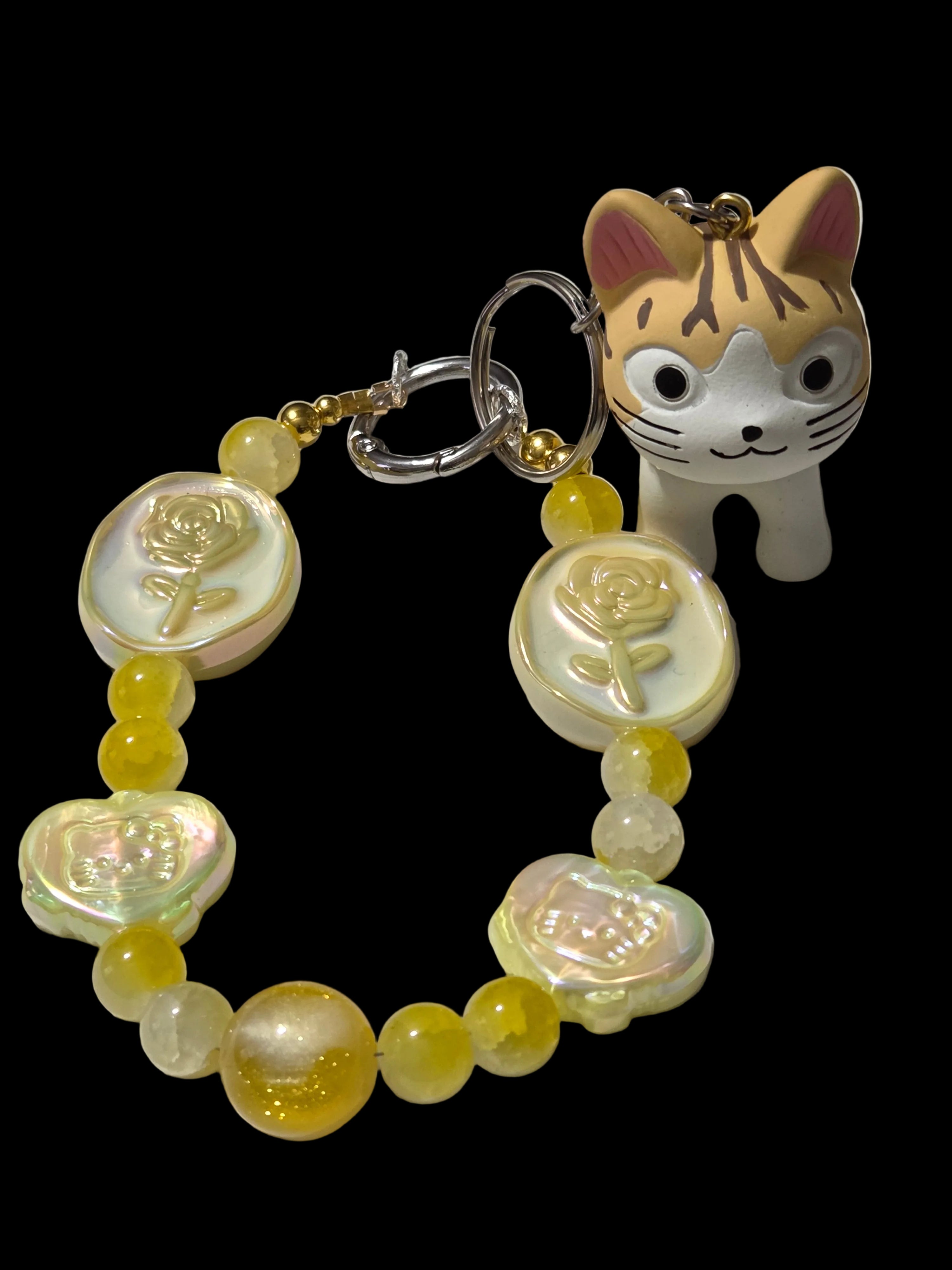 Yellow , gold 3d figure Keychains